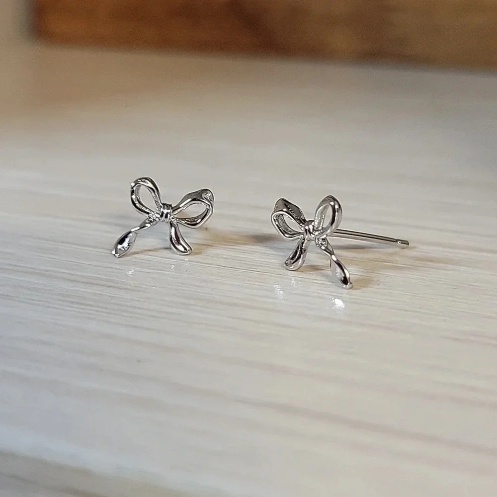 COQUETTE BOW STUD EARRINGS